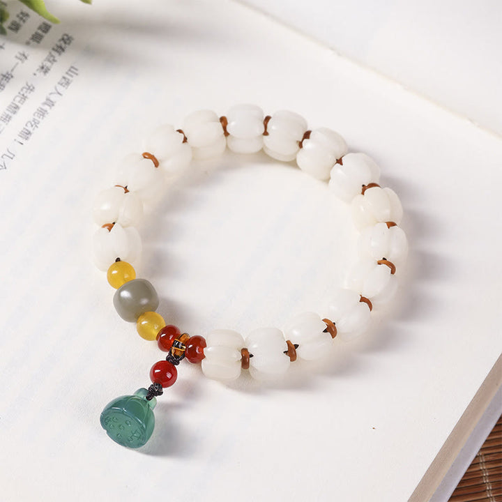 Natürliches Bodhi-Samen-Rotachat-Bodhi-Ruheharmonie-Gravur-Kürbisperlen-Lotus-Armband