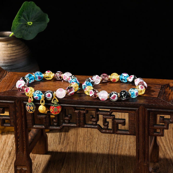Buddha Stones Gold Schluckendes Biest Familie Rosa Liebesherz Leuchtendes fluoreszierendes Liuli-Glasperlenarmband