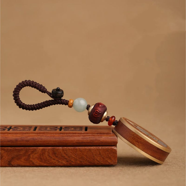 Buddha Stones Ebenholz Palisander Buddha Avalokitesvara Om Mani Padme Hum Balance Auto Schlüsselanhänger Dekoration