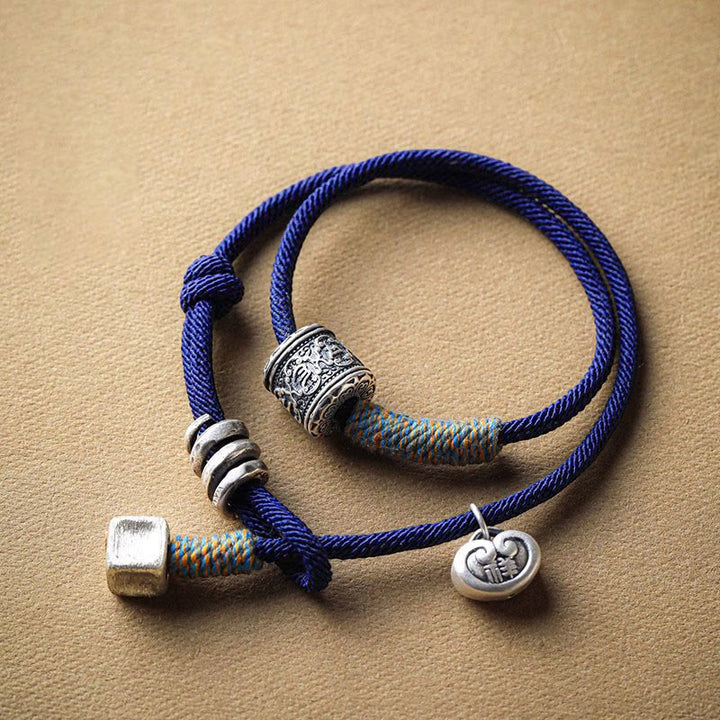 Buddha Stones Handgefertigtes tibetisches Om Mani Padme Hum geschnitztes, glückverheißendes Amulett, doppelt gewickeltes Seilarmband