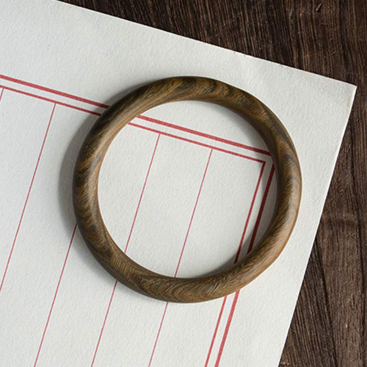 Buddha Stones Tibetisches kleines Blatt rotes Sandelholz Ebenholz grünes Sandelholz Schutzarmband Armreif