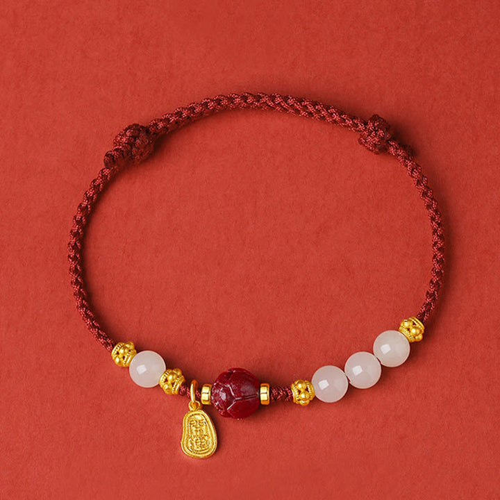 Buddha Stones 24K vergoldetes Hetian Weiß Jade Cinnabar Lotus Glücksseil-Armband