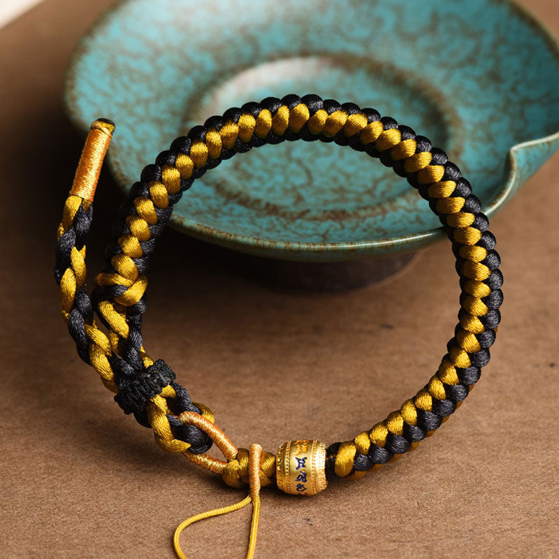 Buddha Stones Handgefertigtes tibetisches Armband mit Drachenschuppen-Seil, Om Mani Padme Hum, Reinheit aus tibetischem Schwarzgold