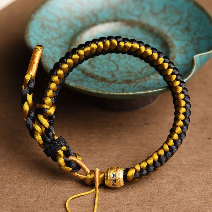 Buddha Stones Handgefertigtes tibetisches Armband mit Drachenschuppen-Seil, Om Mani Padme Hum, Reinheit aus tibetischem Schwarzgold