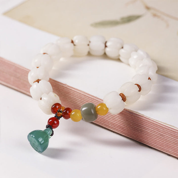 Natürliches Bodhi-Samen-Rotachat-Bodhi-Ruheharmonie-Gravur-Kürbisperlen-Lotus-Armband