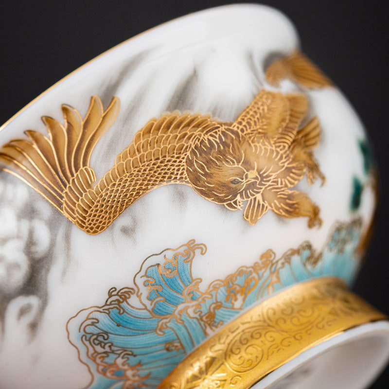 Buddha Stones, goldener Adler, verheißungsvoller Drache, Sonne, Ozean, Wellen, vergoldete Keramik-Teetasse, Kung-Fu-Teetasse