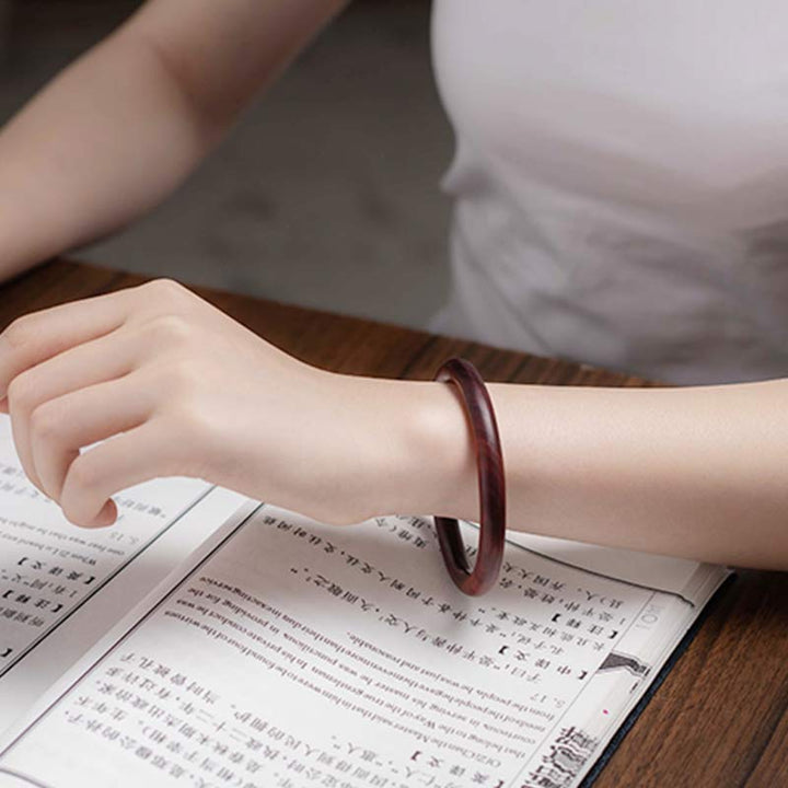 Buddha Stones Tibetisches kleines Blatt rotes Sandelholz Ebenholz grünes Sandelholz Schutzarmband Armreif