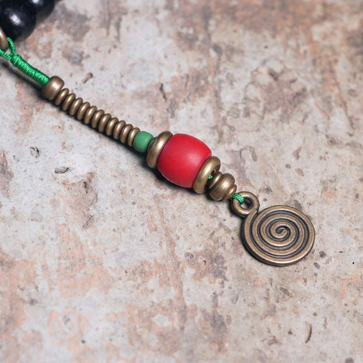 Buddha Stones 108 Perlen Mala Ebenholz Holz Dzi Perle Kupfer Balance Quaste Armband