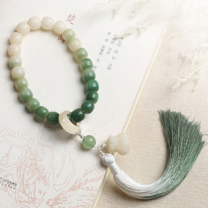 Natürlicher Farbverlauf Bodhi Seed Fortune Geldbeutel Lotus Weisheit Quaste Handgelenk Mala