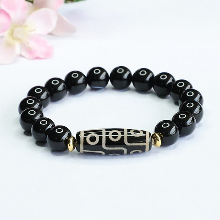 Buddha Stones Tibetisches Neun-Augen-Dzi-Perlen-Armband aus schwarzem Onyx