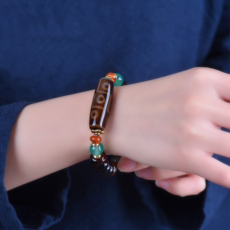 Buddha Stones Tibetisches natürliches neunäugiges Dzi-Perlenschutzarmband mit dreiäugigen Dzi-Perlen