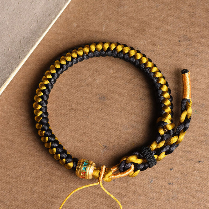 Buddha Stones Handgefertigtes tibetisches Armband mit Drachenschuppen-Seil, Om Mani Padme Hum, Reinheit aus tibetischem Schwarzgold
