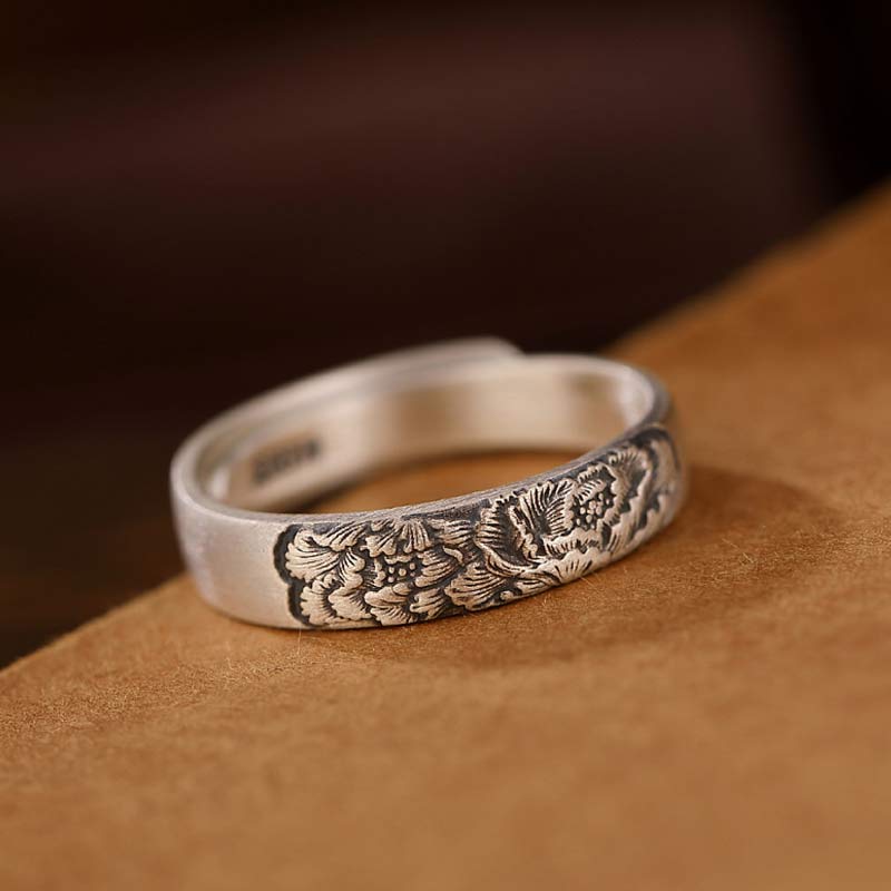 Erleuchtungsring aus 999er-Sterlingsilber mit Lotus- und Pfingstrosenblüten