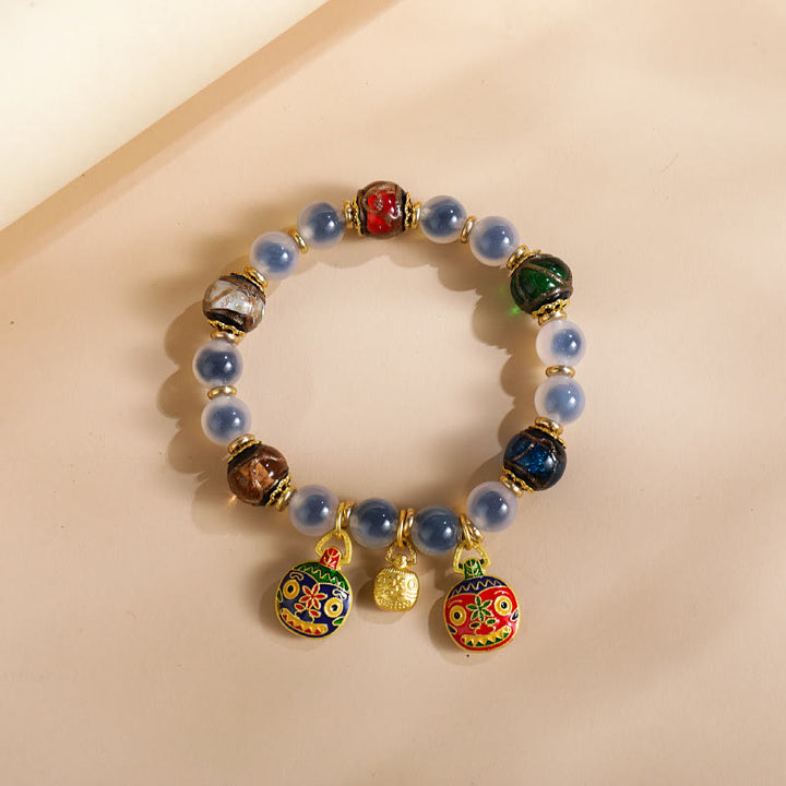 Buddha Stones, buntes Bonbon-Achat-Gold, schluckendes Biest, Familie Liuli, Glasperlen, Stärke-Armband