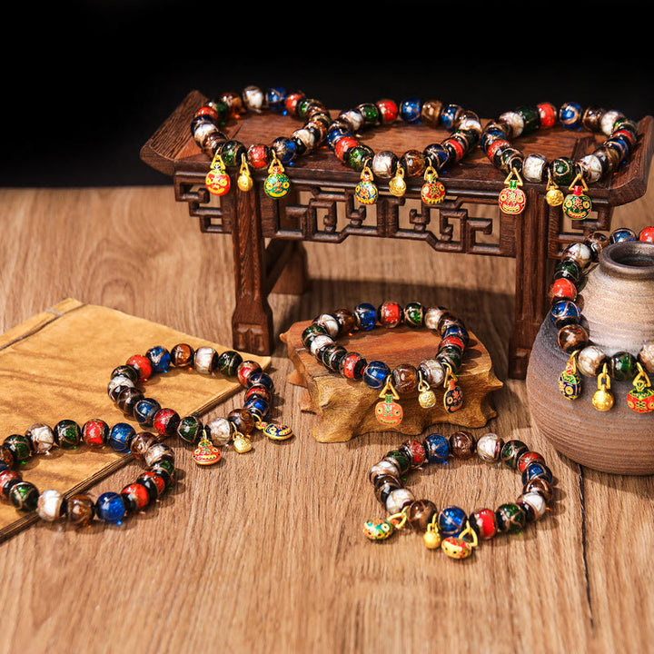 Buddha Stones Five Elements Gold Schlucktier Familie Charm Liuli Glasperlen Glücksarmband