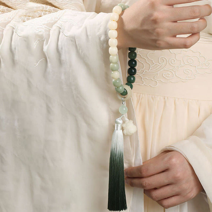 Natürlicher Farbverlauf Bodhi Seed Fortune Geldbeutel Lotus Weisheit Quaste Handgelenk Mala