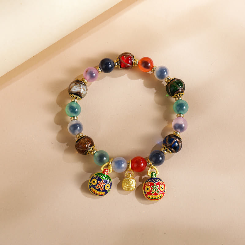 Buddha Stones, buntes Bonbon-Achat-Gold, schluckendes Biest, Familie Liuli, Glasperlen, Stärke-Armband