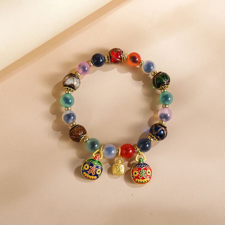 Buddha Stones, buntes Bonbon-Achat-Gold, schluckendes Biest, Familie Liuli, Glasperlen, Stärke-Armband
