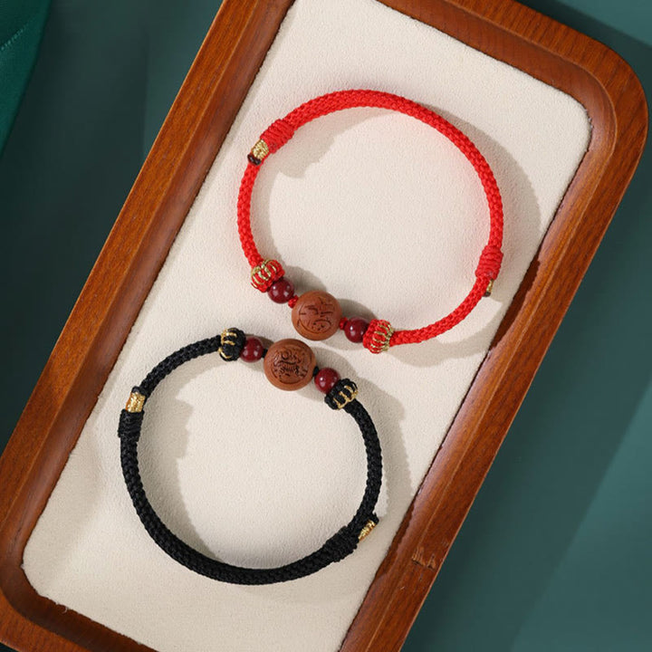 Armband mit Buddha Stonesn, natürlichem Pfirsichholz, chinesischem Sternzeichen Fu, geschnitztem Zinnober-Reichtumsarmband