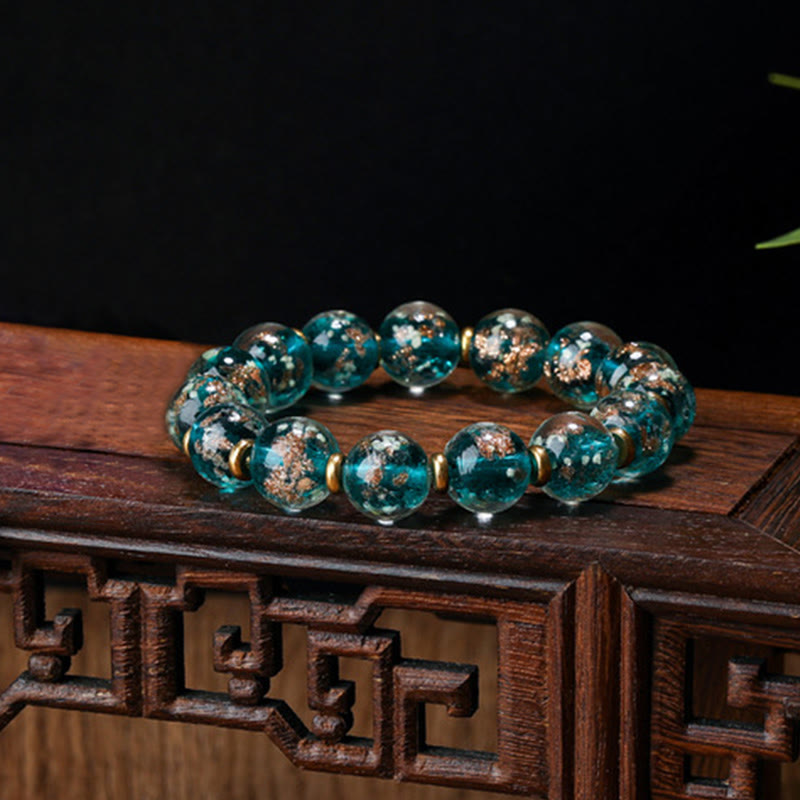 Buddha Stones Gold Schlucktier Familie Charm Leuchtendes fluoreszierendes Liuli-Glasperlen-Erfolgsarmband