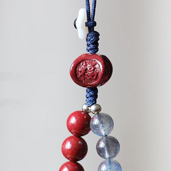 Natürlicher Mondstein, Zinnober, ruhige, positive Telefondekoration