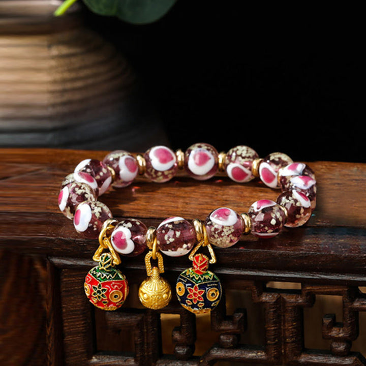 Buddha Stones Gold Schluckendes Biest Familie Rosa Liebesherz Leuchtendes fluoreszierendes Liuli-Glasperlenarmband