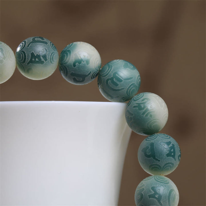 Buddha Stones Bodhi Seed Om Mani Padme Hum Armband mit Gravur „Keep Away Evil Spirits“.