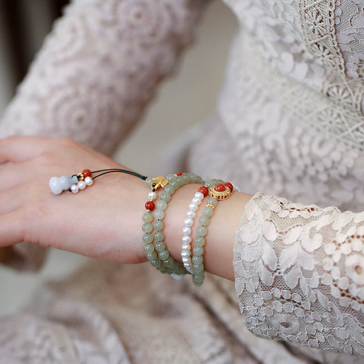 Buddha Stones 925 Sterling Silber vergoldet natürliche Hetian Jade Perle Schmetterling Kürbis Glück Armband