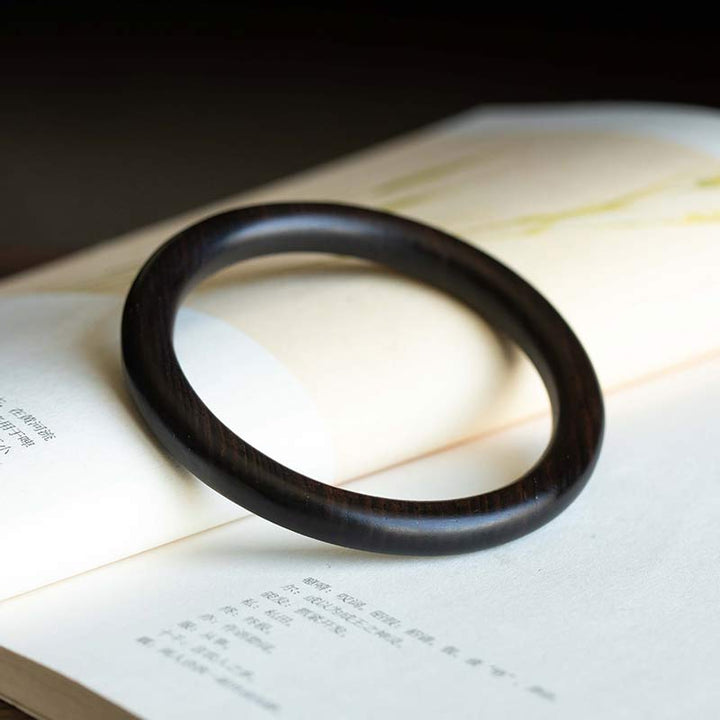 Buddha Stones Tibetisches kleines Blatt rotes Sandelholz Ebenholz grünes Sandelholz Schutzarmband Armreif