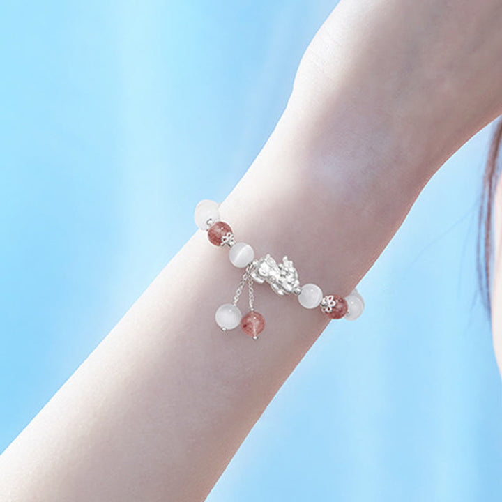 Buddha Stones Natürliches Katzenauge-Mondstein-Erdbeerquarz-PiXiu-Stützarmband