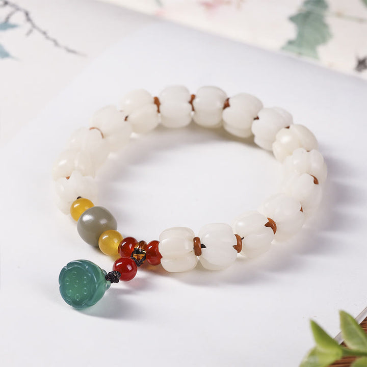 Natürliches Bodhi-Samen-Rotachat-Bodhi-Ruheharmonie-Gravur-Kürbisperlen-Lotus-Armband