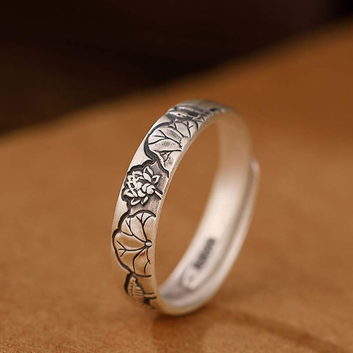 Erleuchtungsring aus 999er-Sterlingsilber mit Lotus- und Pfingstrosenblüten