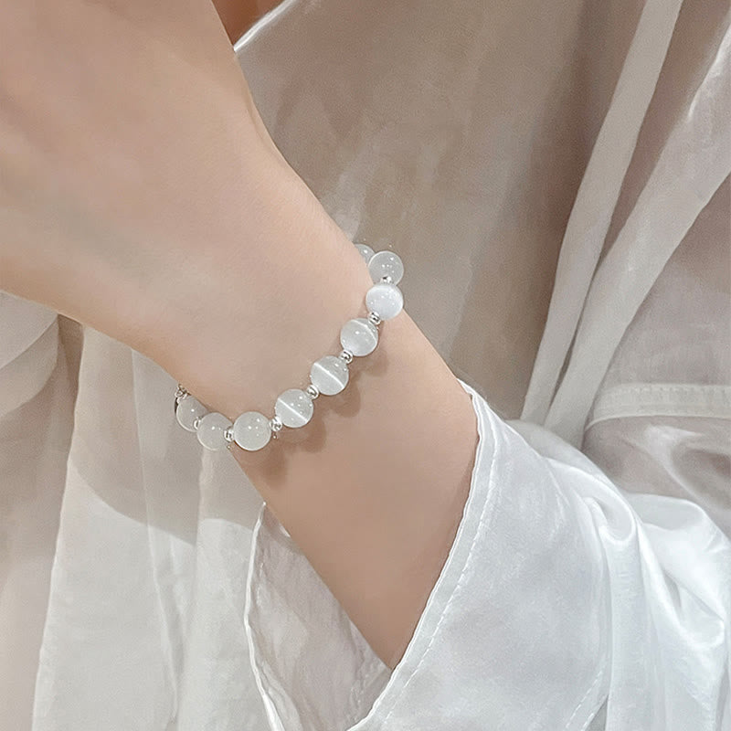 Buddha Stones Natürliches Katzenauge-Mondstein-Erdbeerquarz-PiXiu-Stützarmband