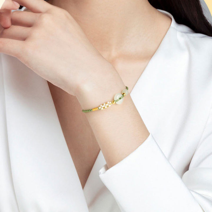 Buddha Stones Hetian Jade Friedensschnalle Glück Pfirsichblüte geflochtenes Armband