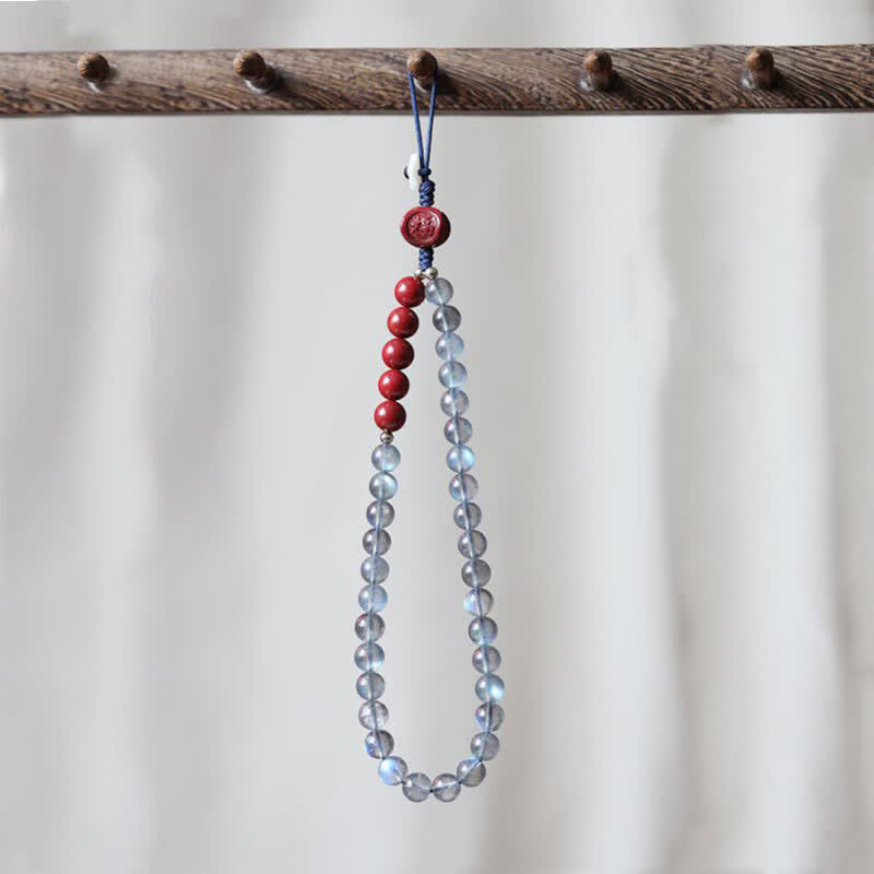 Natürlicher Mondstein, Zinnober, ruhige, positive Telefondekoration