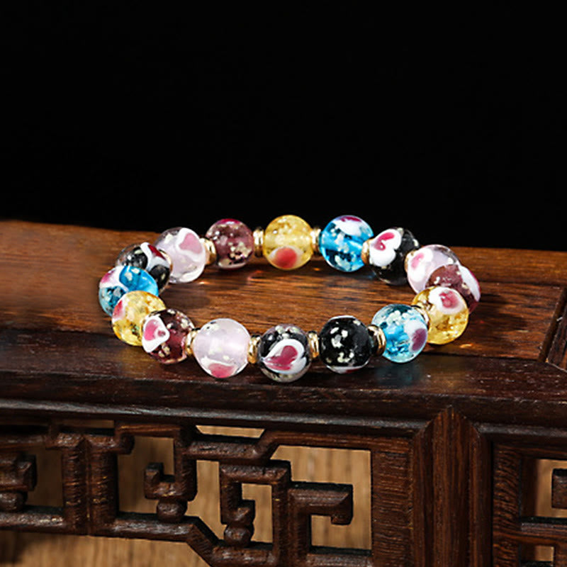 Buddha Stones Gold Schluckendes Biest Familie Rosa Liebesherz Leuchtendes fluoreszierendes Liuli-Glasperlenarmband