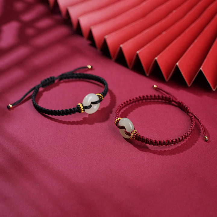 Geflochtenes Armband mit Buddha Stonesn, Peace-Schnalle, Jade, Abundance