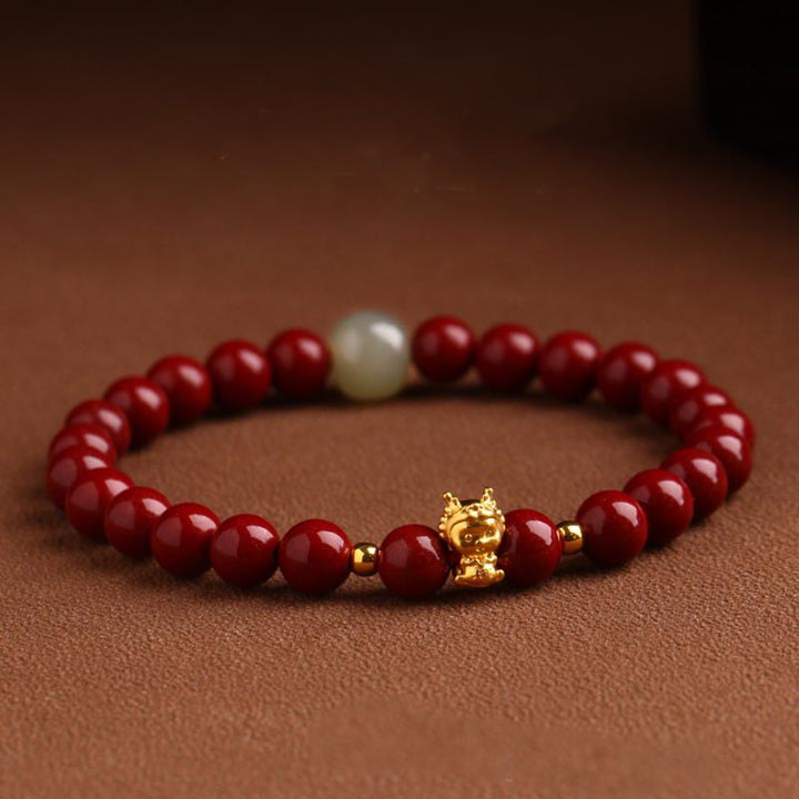 Buddha Stones 999 Gold Jahr des Drachen natürliches Zinnober-Jade-Kupfer-Münze-Fu-Charakter-Segen-Armband