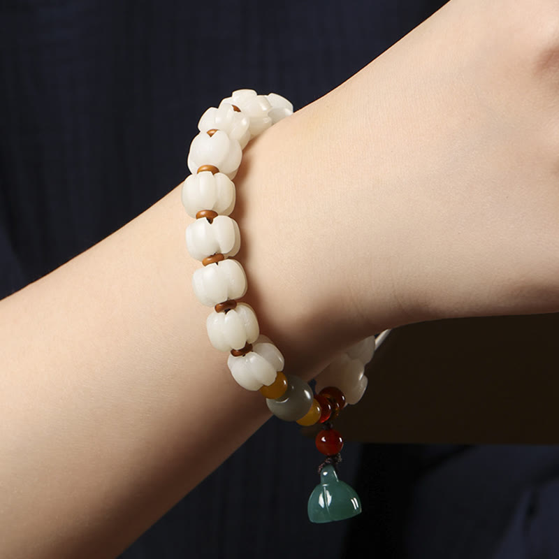 Natürliches Bodhi-Samen-Rotachat-Bodhi-Ruheharmonie-Gravur-Kürbisperlen-Lotus-Armband