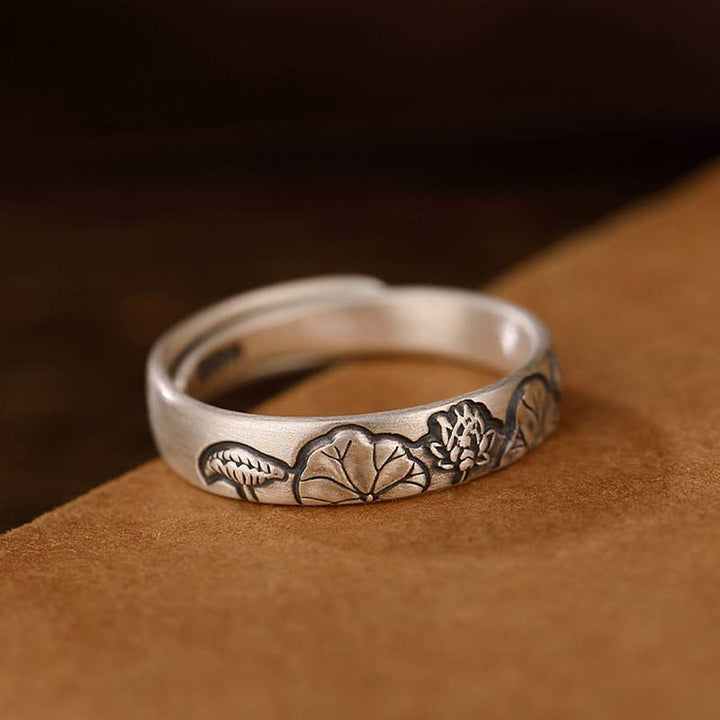 Erleuchtungsring aus 999er-Sterlingsilber mit Lotus- und Pfingstrosenblüten