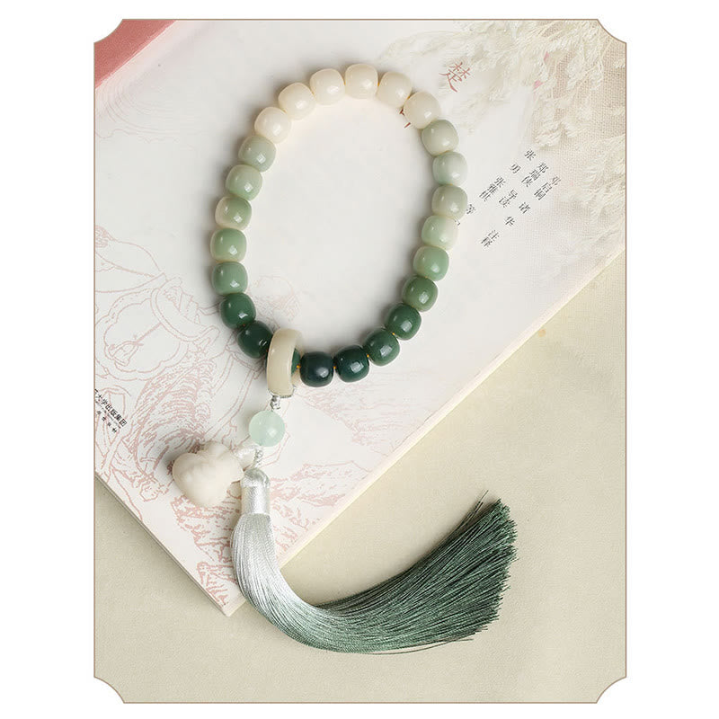 Natürlicher Farbverlauf Bodhi Seed Fortune Geldbeutel Lotus Weisheit Quaste Handgelenk Mala