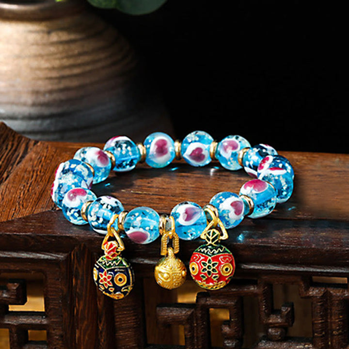 Buddha Stones Gold Schluckendes Biest Familie Rosa Liebesherz Leuchtendes fluoreszierendes Liuli-Glasperlenarmband
