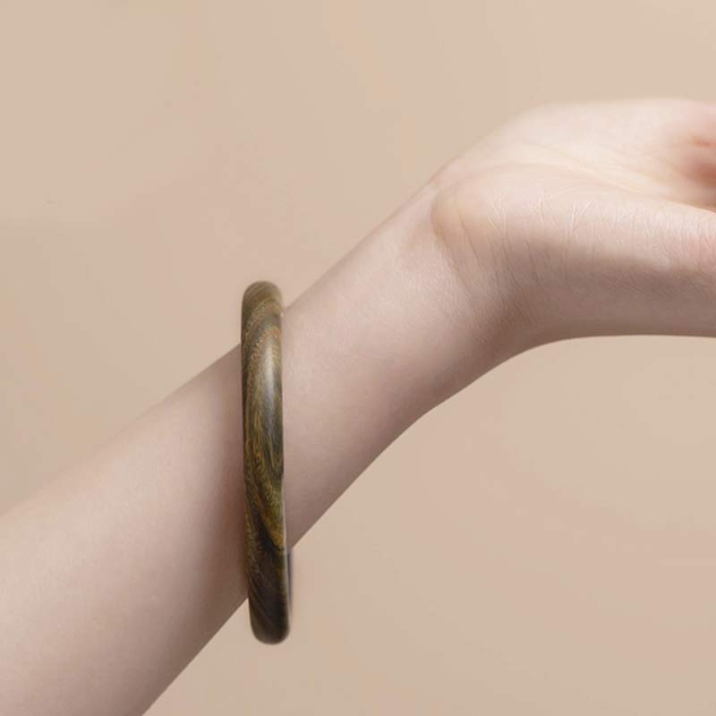 Buddha Stones Tibetisches kleines Blatt rotes Sandelholz Ebenholz grünes Sandelholz Schutzarmband Armreif