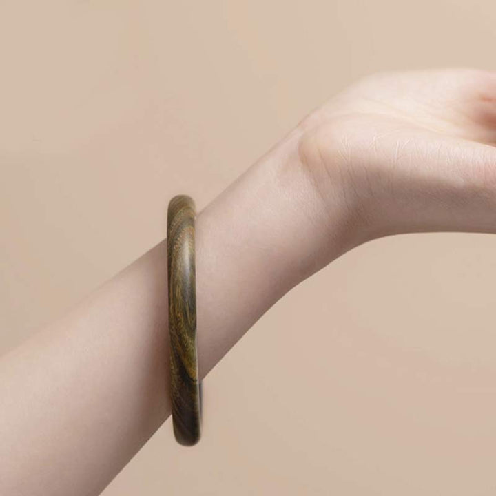 Buddha Stones Tibetisches kleines Blatt rotes Sandelholz Ebenholz grünes Sandelholz Schutzarmband Armreif