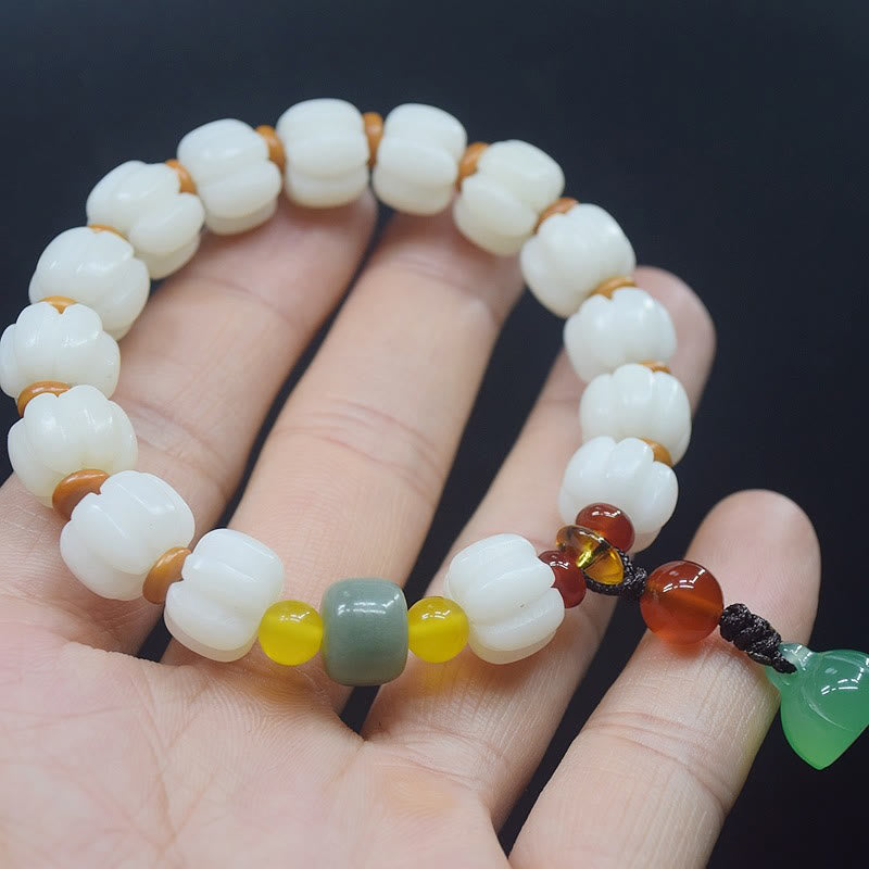 Natürliches Bodhi-Samen-Rotachat-Bodhi-Ruheharmonie-Gravur-Kürbisperlen-Lotus-Armband