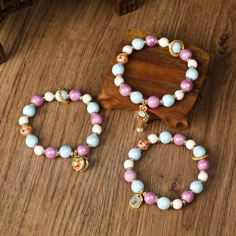 Buddha Stones, tibetische Zakiram-Göttin des Reichtums, Kaninchen-Löwenkopf-Charm, Liuli-Glas, Weihrauch, Esche, Porzellanperlen, Schutzarmband