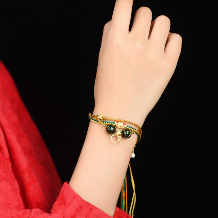 Buddha Stones Tibetisches handgemachtes Seil Liuli Glasperlen geflochtenes mehrschichtiges Heilarmband