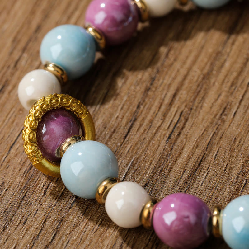 Buddha Stones, tibetische Zakiram-Göttin des Reichtums, Kaninchen-Löwenkopf-Charm, Liuli-Glas, Weihrauch, Esche, Porzellanperlen, Schutzarmband