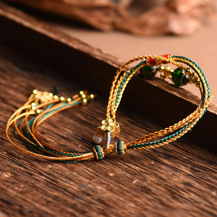 Buddha Stones Tibetisches handgemachtes Seil Liuli Glasperlen geflochtenes mehrschichtiges Heilarmband