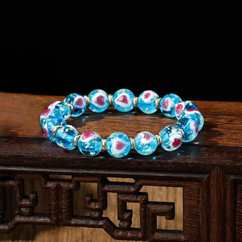 Buddha Stones Gold Schluckendes Biest Familie Rosa Liebesherz Leuchtendes fluoreszierendes Liuli-Glasperlenarmband